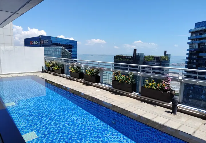 Completed blue-tiled rooftop pool