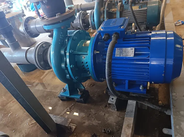 New blue pool pump installed with existing pipework