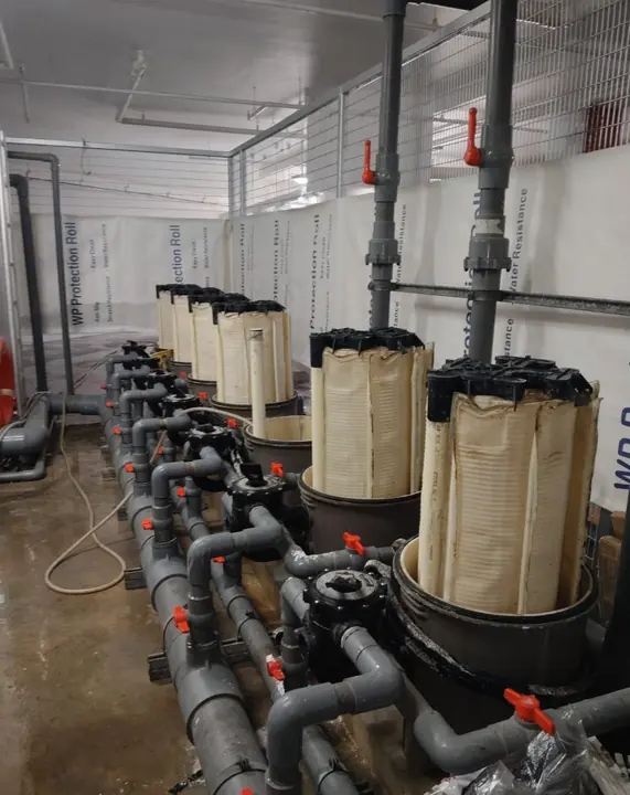 Bank of cartridge filters and connected pipework